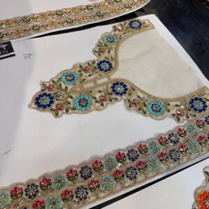 Floral Cut Dana Neck with Sleeves.